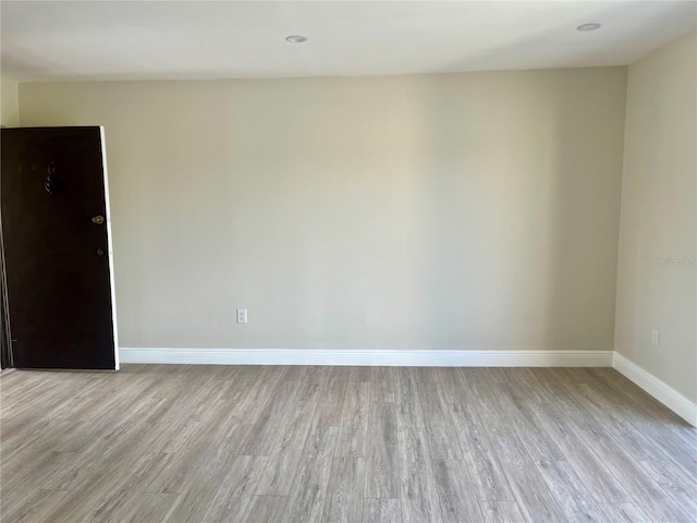 2636 Hidden Lake Dr N Unit G, Sarasota, FL 34237 - empty room with light wood-style flooring