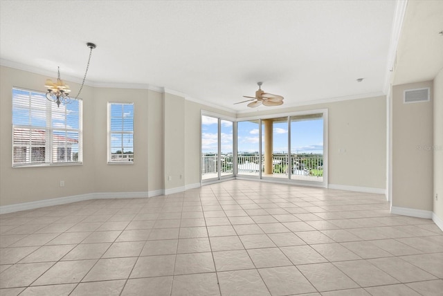 5100 Jessie Harbor Dr Unit 701, Osprey, FL 34229 - unfurnished room with ornamental molding, a chandelier, healthy amount of natural light, a ceiling fan, and light tile patterned flooring