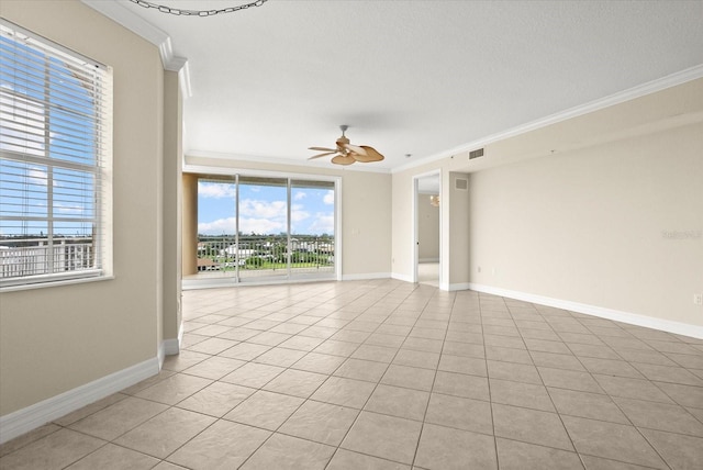 5100 Jessie Harbor Dr Unit 701, Osprey, FL 34229 - unfurnished room with ornamental molding, ceiling fan, and light tile patterned floors