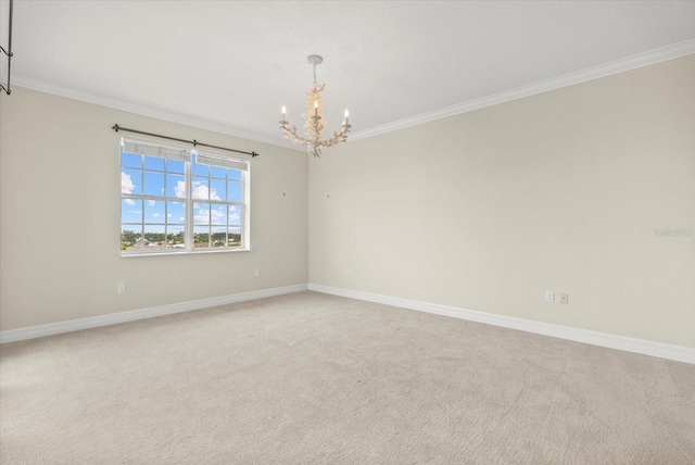 5100 Jessie Harbor Dr Unit 701, Osprey, FL 34229 - empty room with a chandelier, crown molding, and light colored carpet