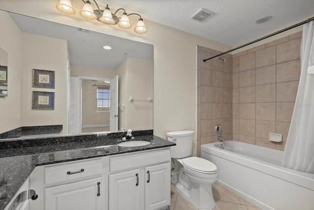 5100 Jessie Harbor Dr Unit 701, Osprey, FL 34229 - full bathroom with vanity, shower / bath combo, tile patterned floors, and a textured ceiling