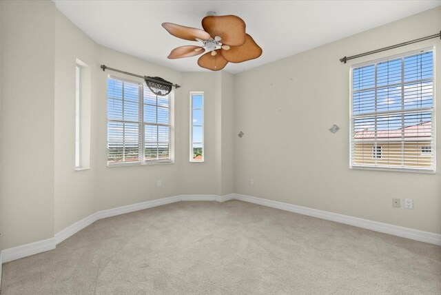 5100 Jessie Harbor Dr Unit 701, Osprey, FL 34229 - spare room with carpet flooring and ceiling fan