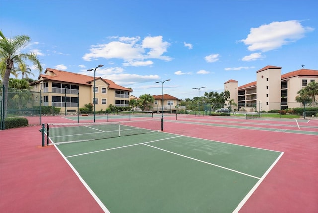 5100 Jessie Harbor Dr Unit 701, Osprey, FL 34229 - view of tennis court with community basketball court