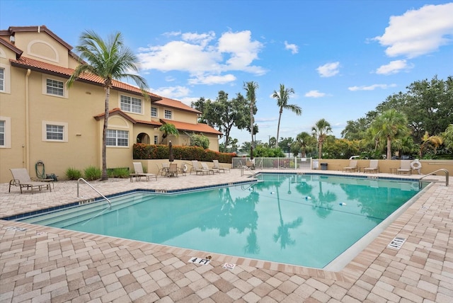 5100 Jessie Harbor Dr Unit 701, Osprey, FL 34229 - community pool featuring a patio area