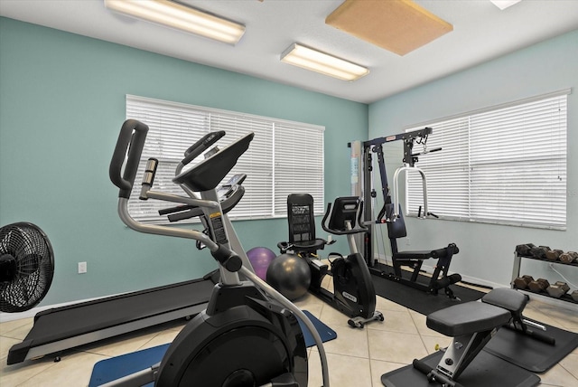 5100 Jessie Harbor Dr Unit 701, Osprey, FL 34229 - exercise room featuring tile patterned flooring