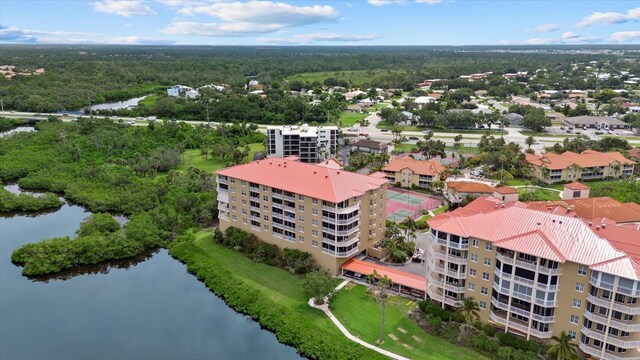 5100 Jessie Harbor Dr Unit 701, Osprey, FL 34229 - bird's eye view of a large body of water and a forest