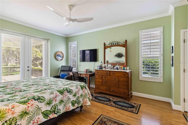 315 36th St NE, Bradenton, FL 34208 - bedroom featuring access to exterior, wood finished floors, crown molding, french doors, and a ceiling fan