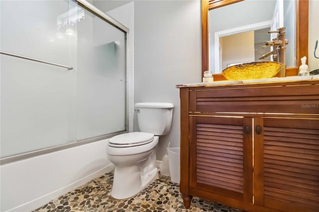 315 36th St NE, Bradenton, FL 34208 - bathroom with vanity and bath / shower combo with glass door