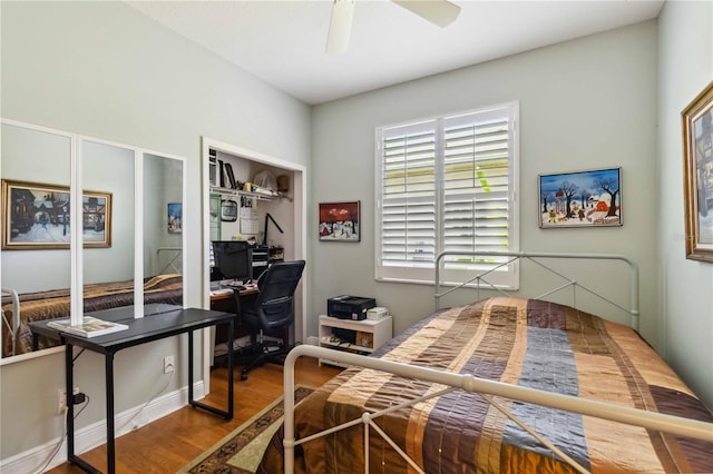 315 36th St NE, Bradenton, FL 34208 - bedroom with wood finished floors, an office area, and a ceiling fan