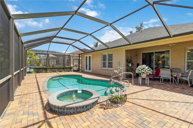 315 36th St NE, Bradenton, FL 34208 - view of swimming pool featuring a patio, a pool with connected hot tub, and a ceiling fan