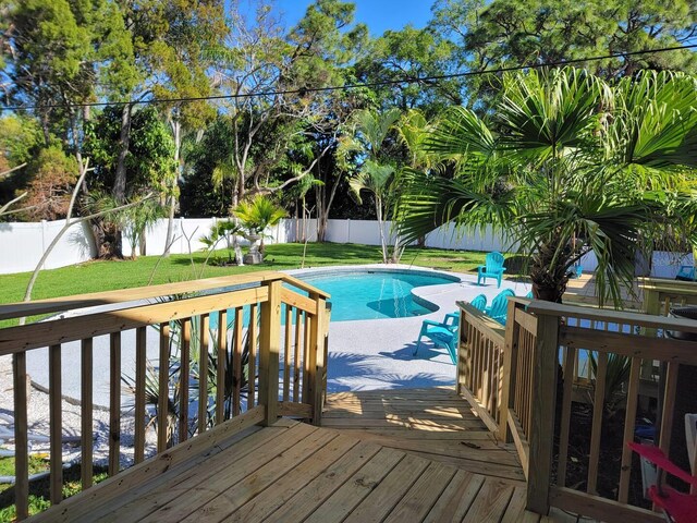 1112 Montezuma Dr, Bradenton, FL 34209 - view of pool with a fenced backyard and a deck