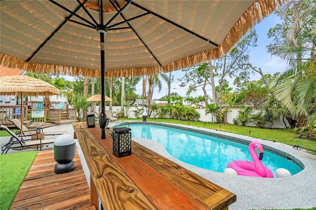 1112 Montezuma Dr, Bradenton, FL 34209 - swimming pool featuring a fenced backyard and a wooden deck