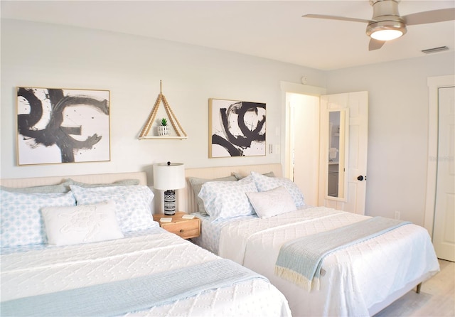 1112 Montezuma Dr, Bradenton, FL 34209 - bedroom featuring wood finished floors and ceiling fan