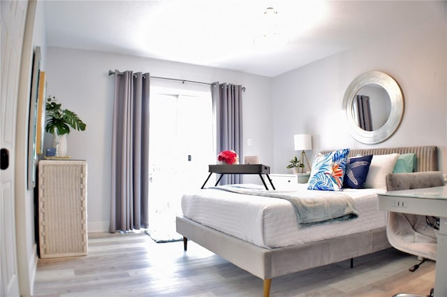 1112 Montezuma Dr, Bradenton, FL 34209 - bedroom with light wood-style floors and baseboards