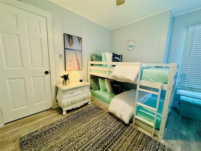 1112 Montezuma Dr, Bradenton, FL 34209 - bedroom with wood finished floors, crown molding, and a ceiling fan