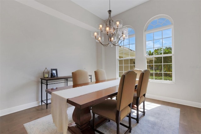 8102 Waterview Blvd, Lakewood Ranch, FL 34202 - dining space featuring a chandelier and wood finished floors