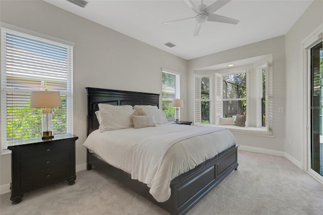 8102 Waterview Blvd, Lakewood Ranch, FL 34202 - bedroom featuring light carpet, multiple windows, and a ceiling fan