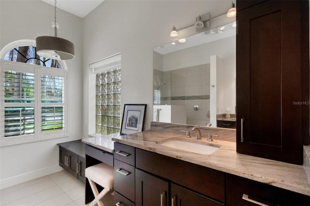 8102 Waterview Blvd, Lakewood Ranch, FL 34202 - bathroom with healthy amount of natural light, a walk in shower, and vanity