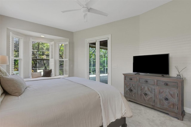 8102 Waterview Blvd, Lakewood Ranch, FL 34202 - bedroom with access to outside, light carpet, and a ceiling fan