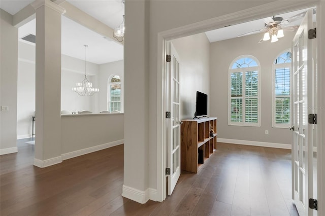 8102 Waterview Blvd, Lakewood Ranch, FL 34202 - entryway featuring hardwood / wood-style flooring, a ceiling fan, and a chandelier