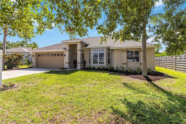 4845 Post Pointe Dr, Sarasota, FL 34233 - single story home with stucco siding, a garage, concrete driveway, and roof with shingles