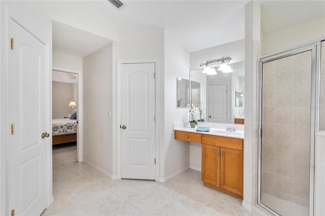 4845 Post Pointe Dr, Sarasota, FL 34233 - full bathroom with ensuite bathroom, a stall shower, vanity, and tile patterned flooring