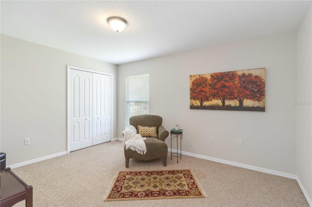 4845 Post Pointe Dr, Sarasota, FL 34233 - sitting room featuring carpet floors and baseboards