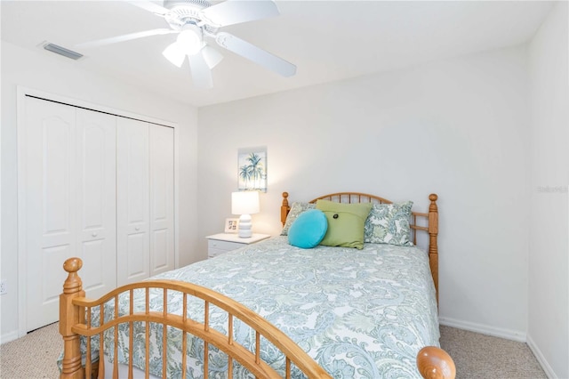 4845 Post Pointe Dr, Sarasota, FL 34233 - bedroom featuring carpet floors, a closet, and a ceiling fan