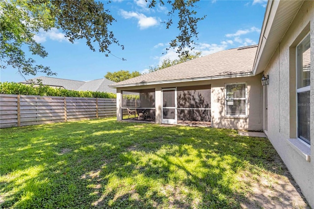 4845 Post Pointe Dr, Sarasota, FL 34233 - fenced backyard featuring a sunroom