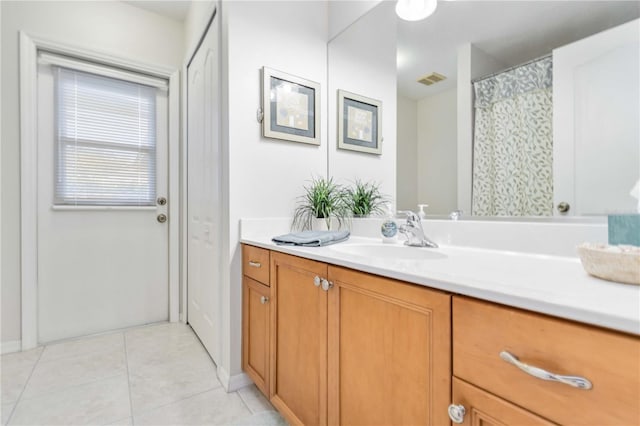 4845 Post Pointe Dr, Sarasota, FL 34233 - bathroom with vanity and tile patterned flooring