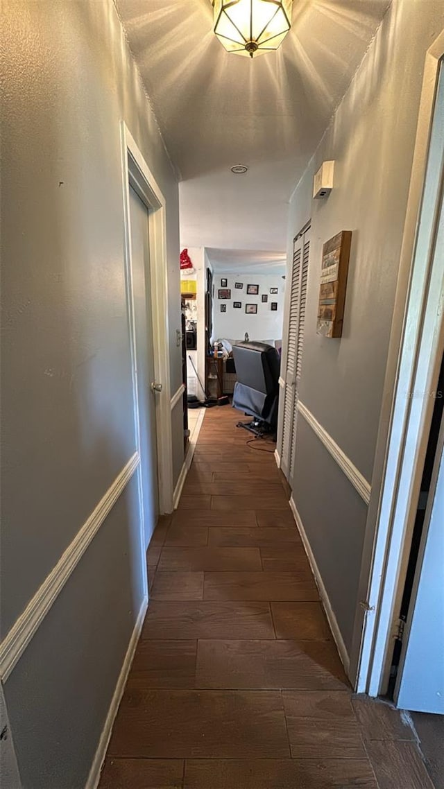 23067 Elmira Blvd, Punta Gorda, FL 33980 - corridor with dark wood-style floors