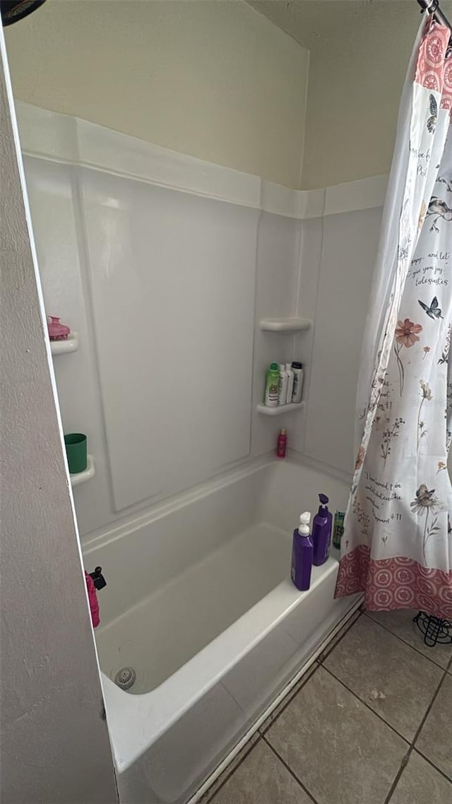 23067 Elmira Blvd, Punta Gorda, FL 33980 - full bathroom featuring tile patterned flooring and shower / bath combo