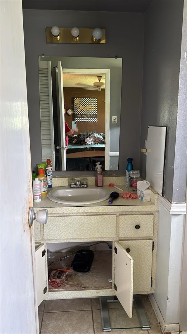 23067 Elmira Blvd, Punta Gorda, FL 33980 - bathroom with tile patterned floors and vanity
