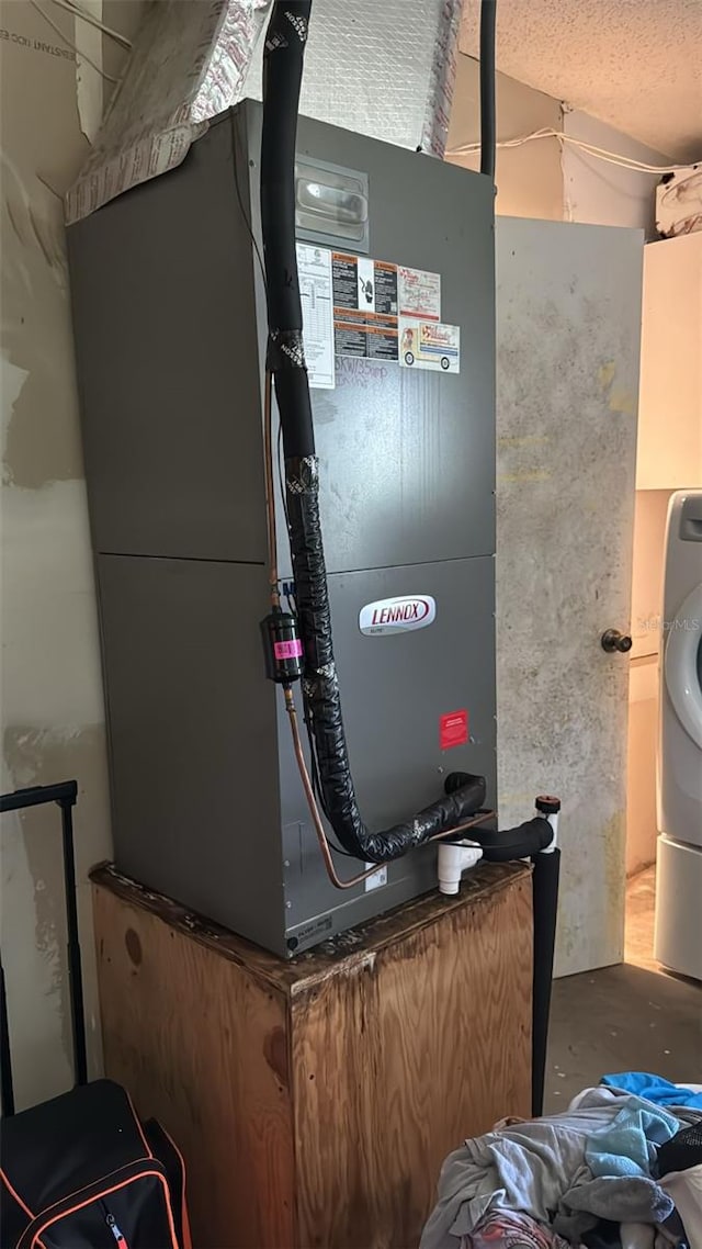 23067 Elmira Blvd, Punta Gorda, FL 33980 - utility room with heating unit