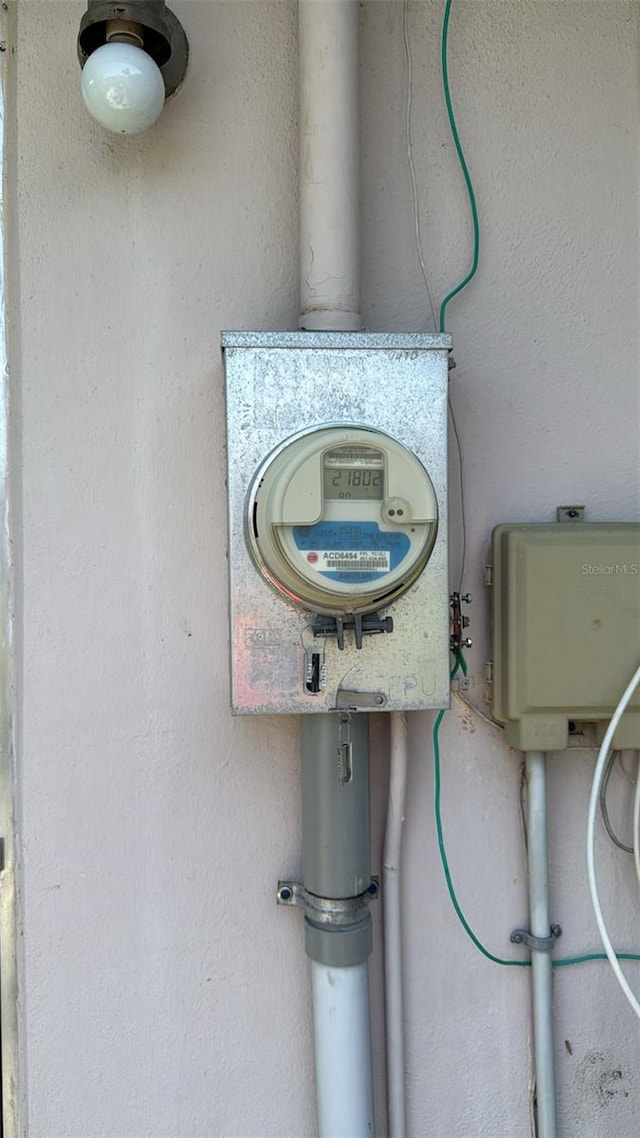 23067 Elmira Blvd, Punta Gorda, FL 33980 - exterior view of electric meter and stucco siding