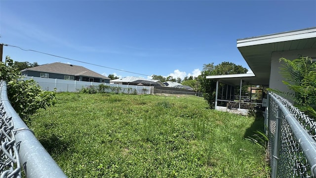 23067 Elmira Blvd, Punta Gorda, FL 33980 - view of yard with a sunroom