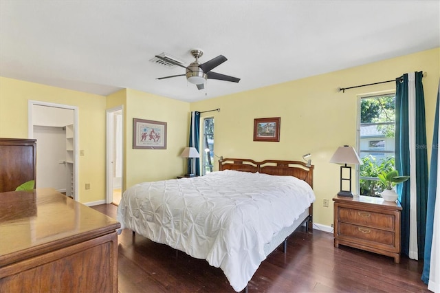 2866 E Rainbow Cir, Sarasota, FL 34231 - bedroom with dark wood finished floors and a ceiling fan