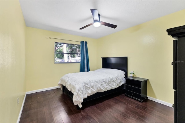 2866 E Rainbow Cir, Sarasota, FL 34231 - bedroom with wood finished floors and ceiling fan