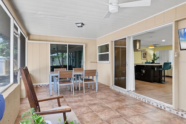 2866 E Rainbow Cir, Sarasota, FL 34231 - sunroom / solarium with outdoor dining area and ceiling fan