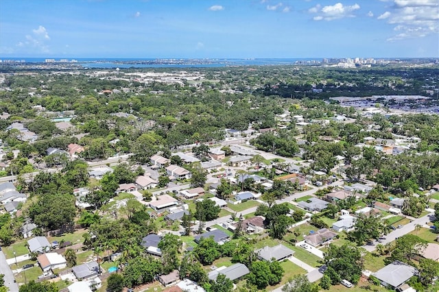 2866 E Rainbow Cir, Sarasota, FL 34231 - aerial view of property and surrounding area featuring a large body of water and nearby suburban area