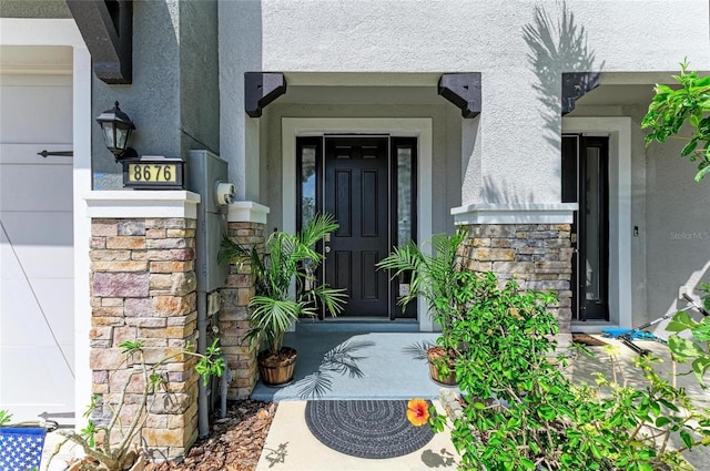 8676 Ice Wine St, Sarasota, FL 34238 - entrance to property with stone siding and stucco siding