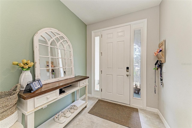 8676 Ice Wine St, Sarasota, FL 34238 - tiled foyer entrance with healthy amount of natural light