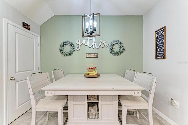 8676 Ice Wine St, Sarasota, FL 34238 - dining area featuring a chandelier and lofted ceiling