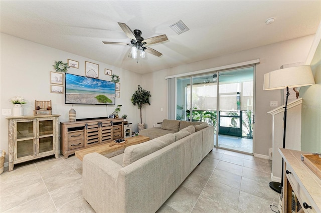8676 Ice Wine St, Sarasota, FL 34238 - living area featuring ceiling fan and light tile patterned flooring