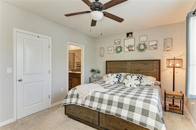 8676 Ice Wine St, Sarasota, FL 34238 - bedroom featuring light colored carpet, connected bathroom, and ceiling fan