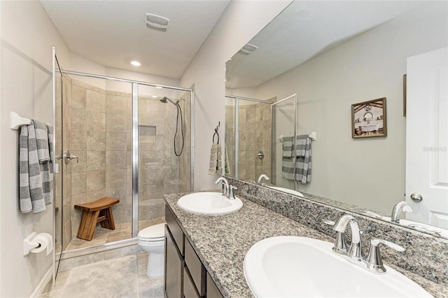 8676 Ice Wine St, Sarasota, FL 34238 - full bathroom featuring a stall shower, double vanity, and tile patterned flooring