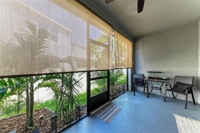 8676 Ice Wine St, Sarasota, FL 34238 - sunroom featuring a ceiling fan