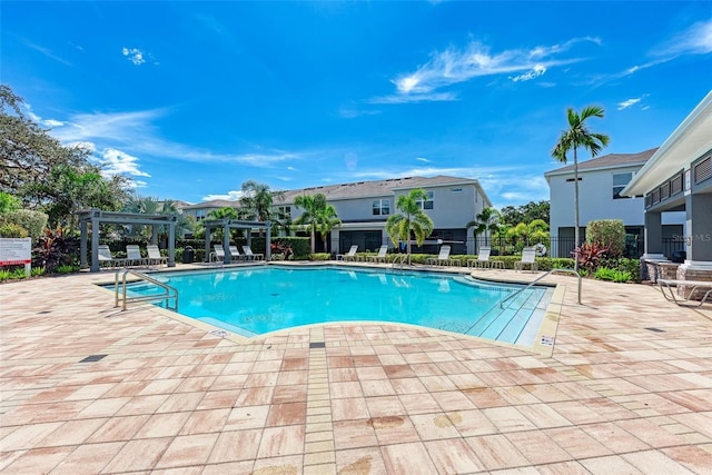 8676 Ice Wine St, Sarasota, FL 34238 - community pool featuring a pergola and a patio