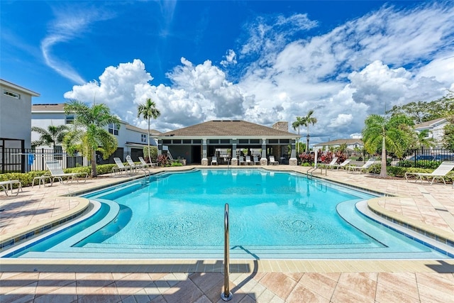 8676 Ice Wine St, Sarasota, FL 34238 - community pool featuring a patio