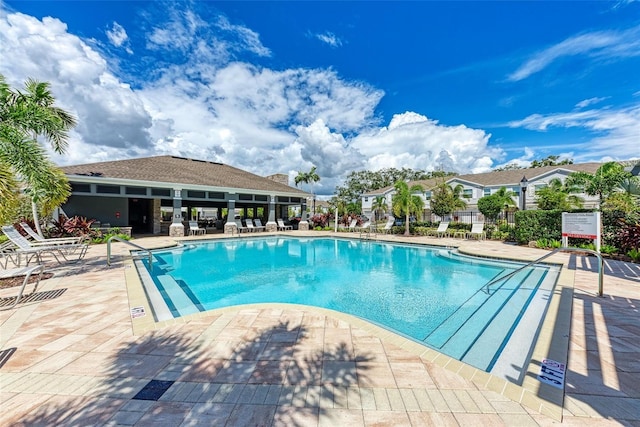 8676 Ice Wine St, Sarasota, FL 34238 - community pool with a patio area